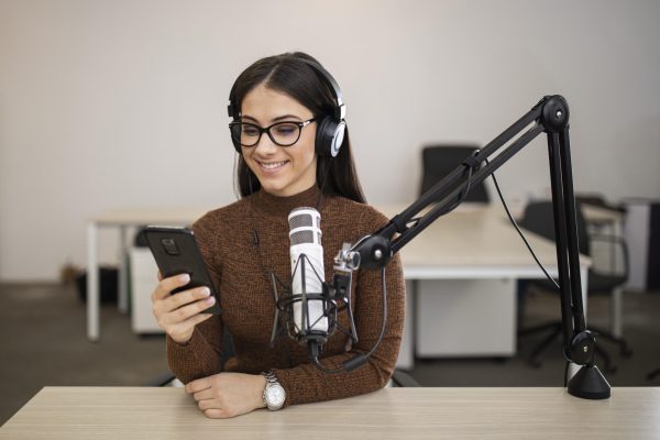 smiley-woman-doing-radio-show